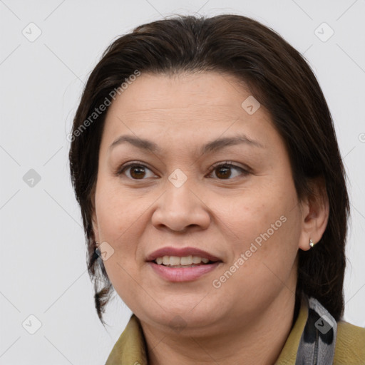 Joyful white adult female with medium  brown hair and brown eyes