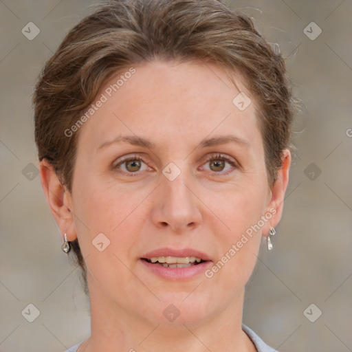 Joyful white adult female with medium  brown hair and grey eyes