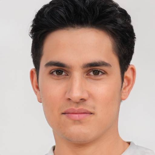 Neutral white young-adult male with short  black hair and brown eyes