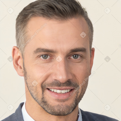 Joyful white adult male with short  brown hair and brown eyes