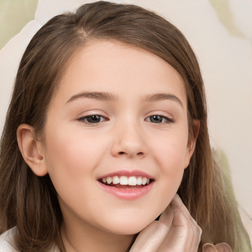 Joyful white child female with medium  brown hair and brown eyes