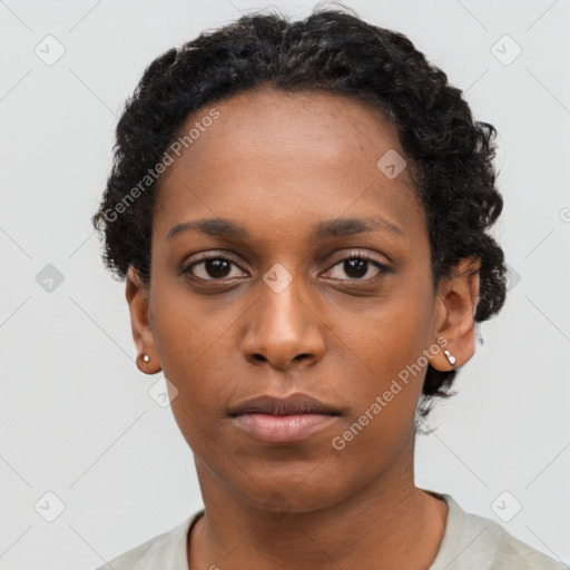 Neutral black young-adult female with short  black hair and brown eyes