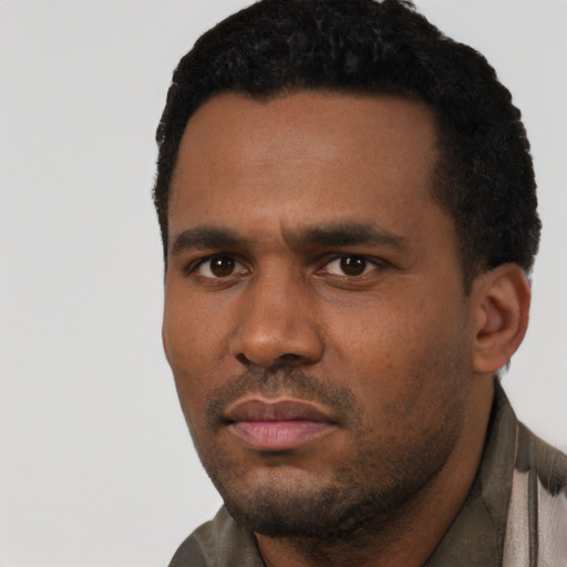 Neutral black young-adult male with short  black hair and brown eyes