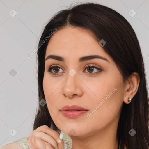 Neutral white young-adult female with long  brown hair and brown eyes