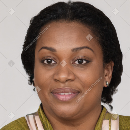 Joyful black adult female with short  brown hair and brown eyes