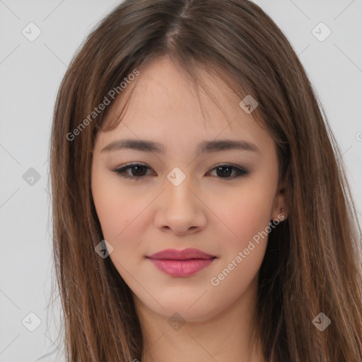 Joyful asian young-adult female with long  brown hair and brown eyes