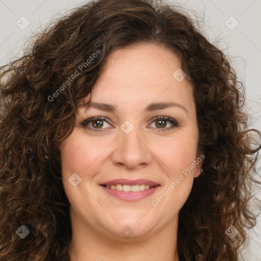 Joyful white adult female with long  brown hair and brown eyes