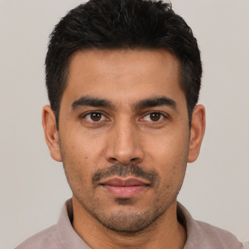Neutral latino young-adult male with short  black hair and brown eyes