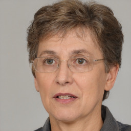 Joyful white middle-aged female with short  brown hair and brown eyes