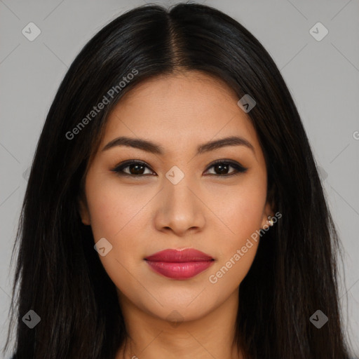 Joyful latino young-adult female with long  brown hair and brown eyes