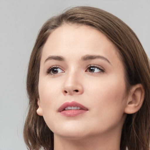 Neutral white young-adult female with medium  brown hair and grey eyes