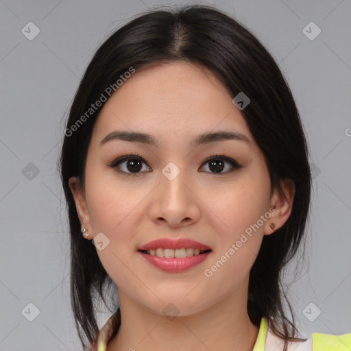 Joyful asian young-adult female with medium  black hair and brown eyes