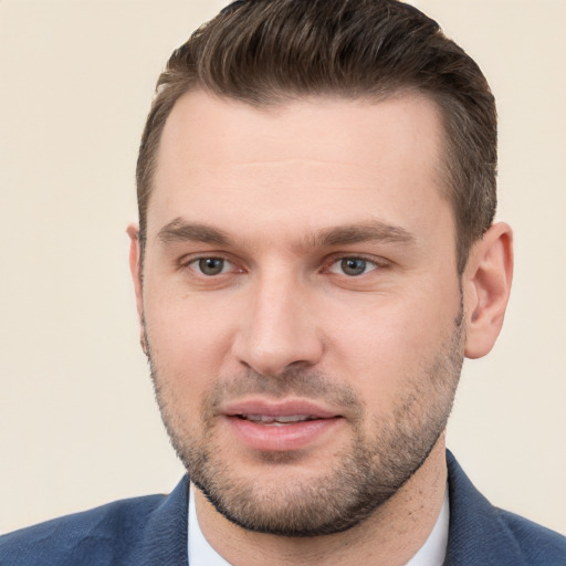 Joyful white young-adult male with short  brown hair and brown eyes