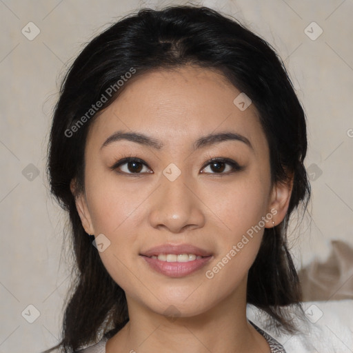 Joyful asian young-adult female with medium  black hair and brown eyes