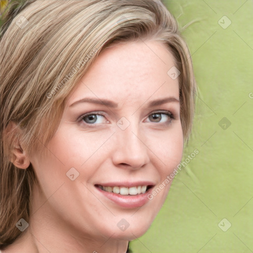 Joyful white young-adult female with medium  brown hair and green eyes