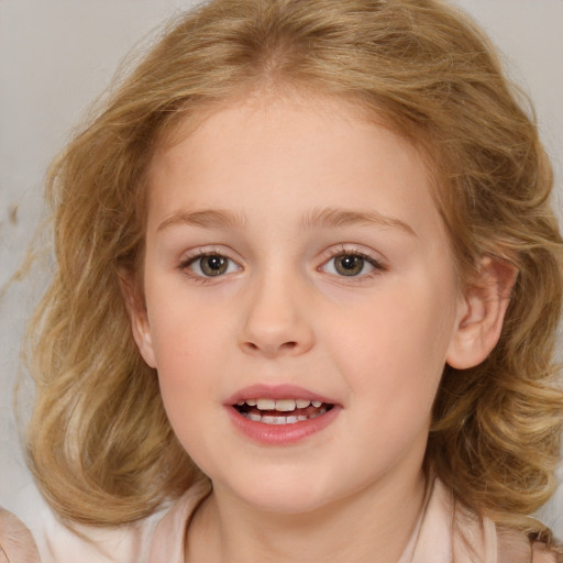 Joyful white child female with medium  brown hair and brown eyes