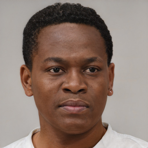Neutral black young-adult male with short  brown hair and brown eyes