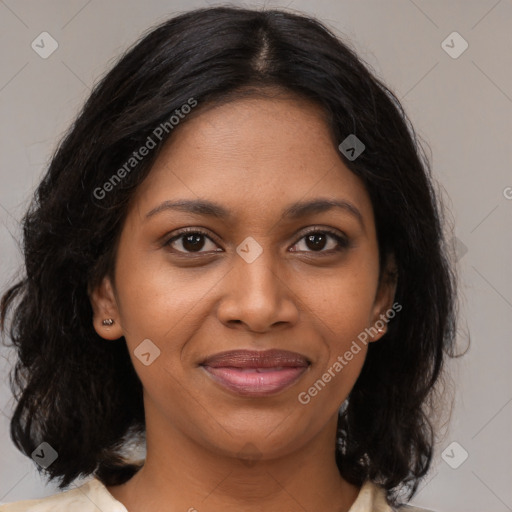 Joyful black young-adult female with medium  brown hair and brown eyes