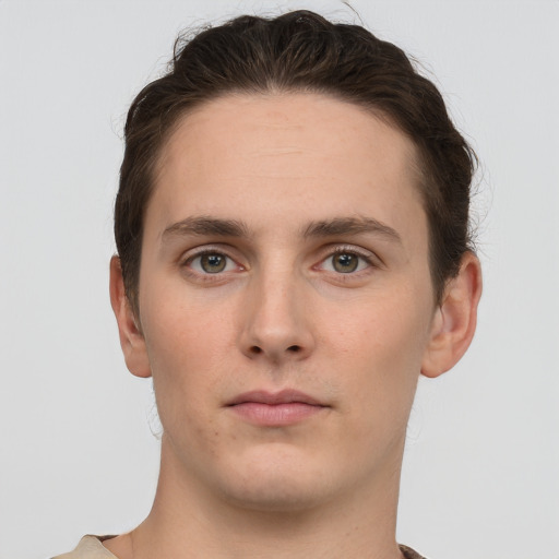 Neutral white young-adult male with short  brown hair and grey eyes