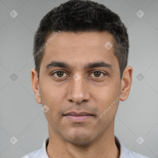Neutral white young-adult male with short  black hair and brown eyes