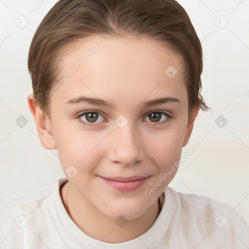 Joyful white child female with short  brown hair and brown eyes