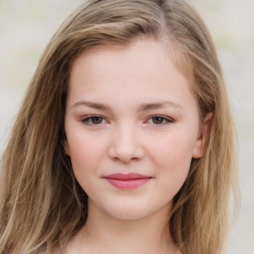 Joyful white child female with long  brown hair and brown eyes