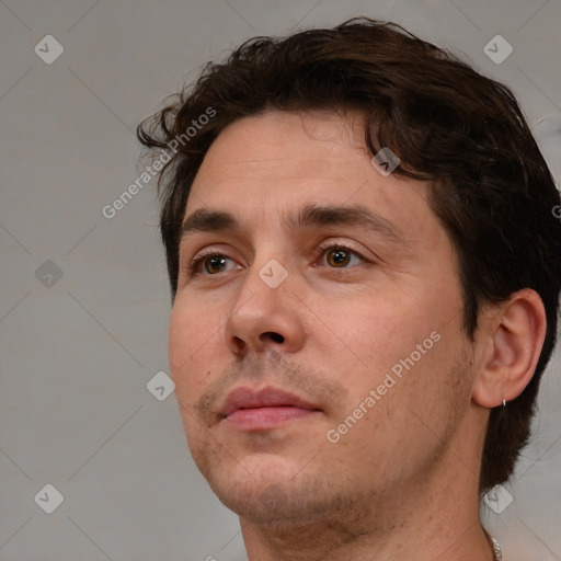 Neutral white adult male with short  brown hair and brown eyes