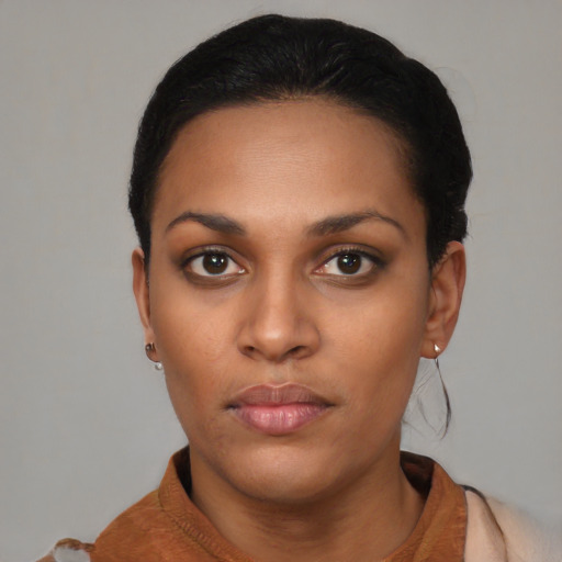 Neutral black young-adult female with short  black hair and brown eyes