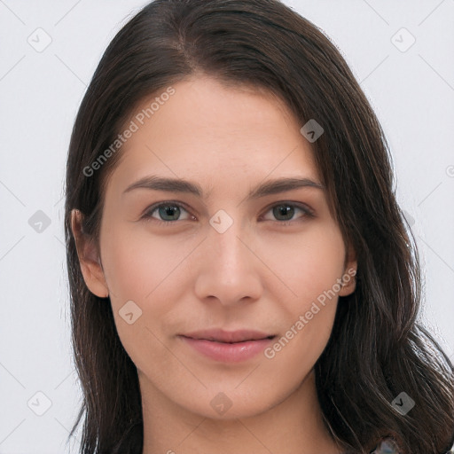 Neutral white young-adult female with long  brown hair and brown eyes