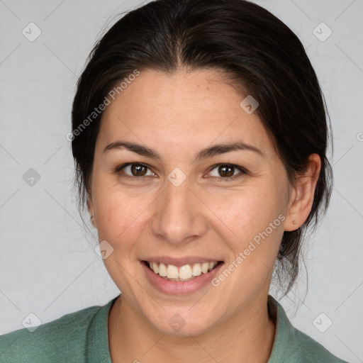 Joyful white adult female with medium  brown hair and brown eyes