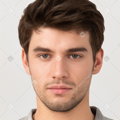 Neutral white young-adult male with short  brown hair and brown eyes