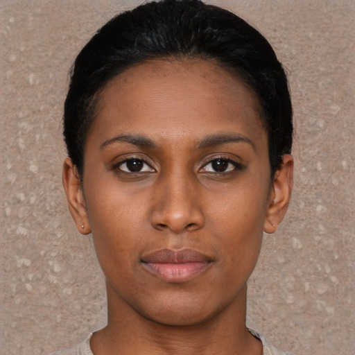 Neutral black young-adult female with short  black hair and brown eyes
