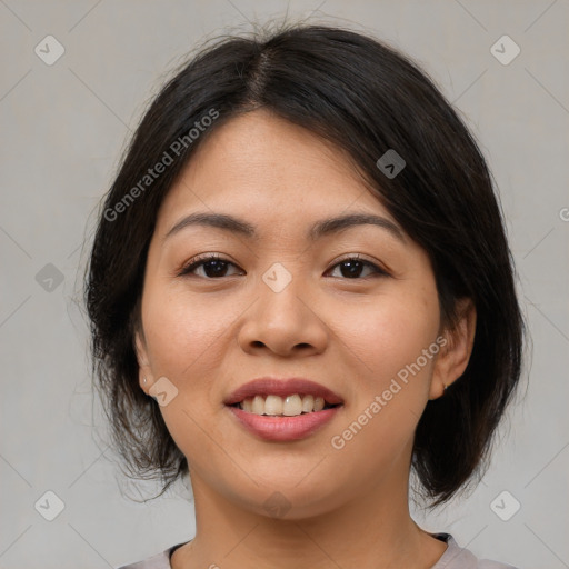 Joyful asian young-adult female with medium  brown hair and brown eyes