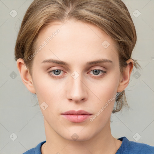 Neutral white young-adult female with medium  brown hair and blue eyes