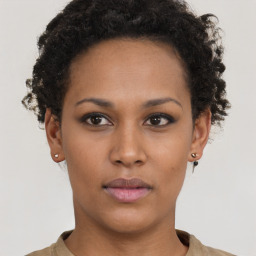 Neutral black young-adult female with short  brown hair and brown eyes