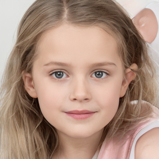 Joyful white child female with long  brown hair and grey eyes