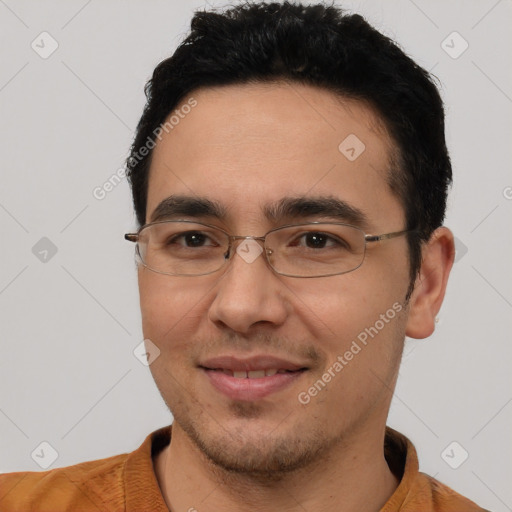 Joyful white young-adult male with short  black hair and brown eyes