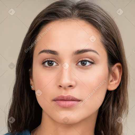 Neutral white young-adult female with long  brown hair and brown eyes