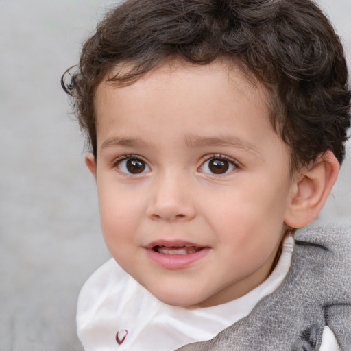 Joyful white child male with short  brown hair and brown eyes