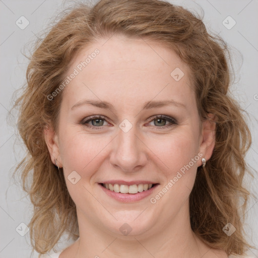 Joyful white young-adult female with medium  brown hair and blue eyes