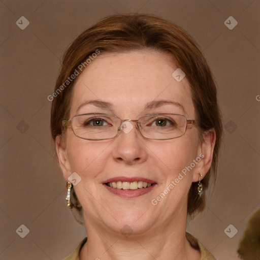 Joyful white adult female with medium  brown hair and blue eyes