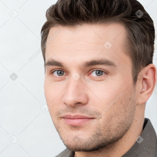 Neutral white young-adult male with short  brown hair and brown eyes