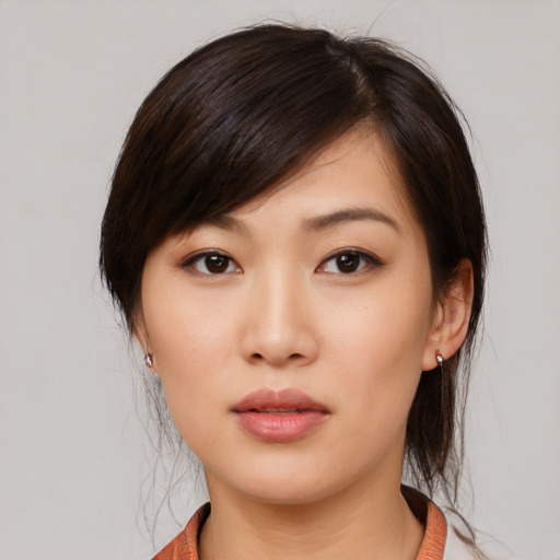 Neutral white young-adult female with medium  brown hair and brown eyes