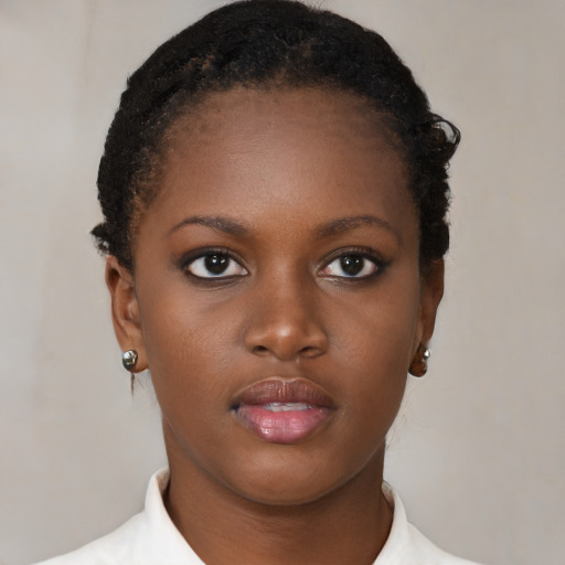 Neutral black young-adult female with short  brown hair and brown eyes