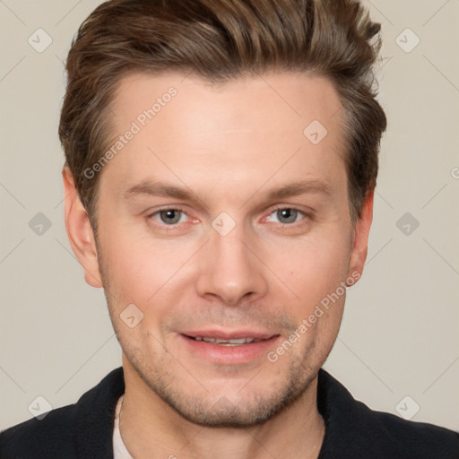 Joyful white adult male with short  brown hair and grey eyes