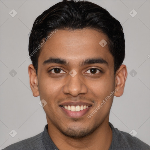Joyful latino young-adult male with short  brown hair and brown eyes