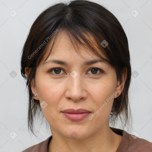 Joyful white adult female with medium  brown hair and brown eyes