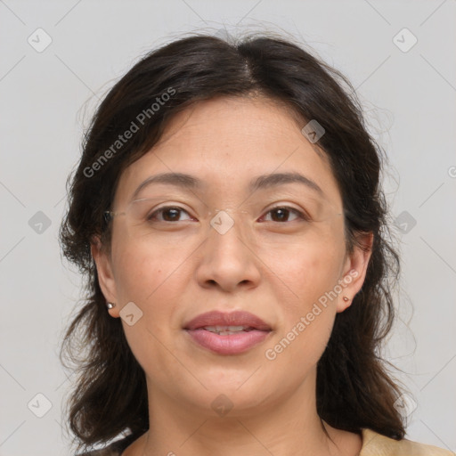 Joyful asian adult female with medium  brown hair and brown eyes