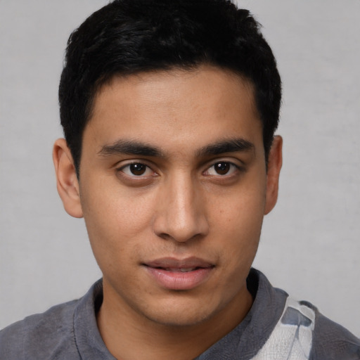 Neutral asian young-adult male with short  black hair and brown eyes