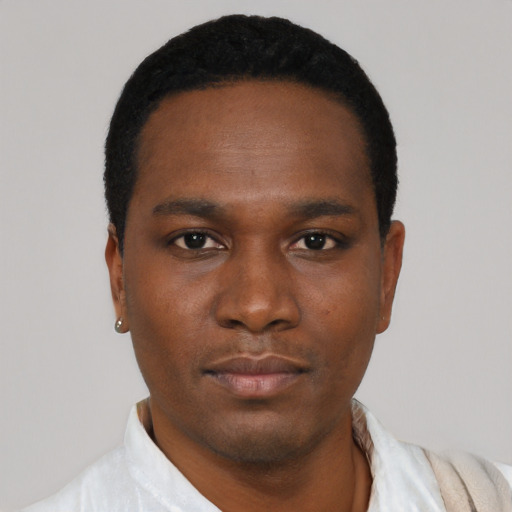 Neutral black young-adult male with short  black hair and brown eyes